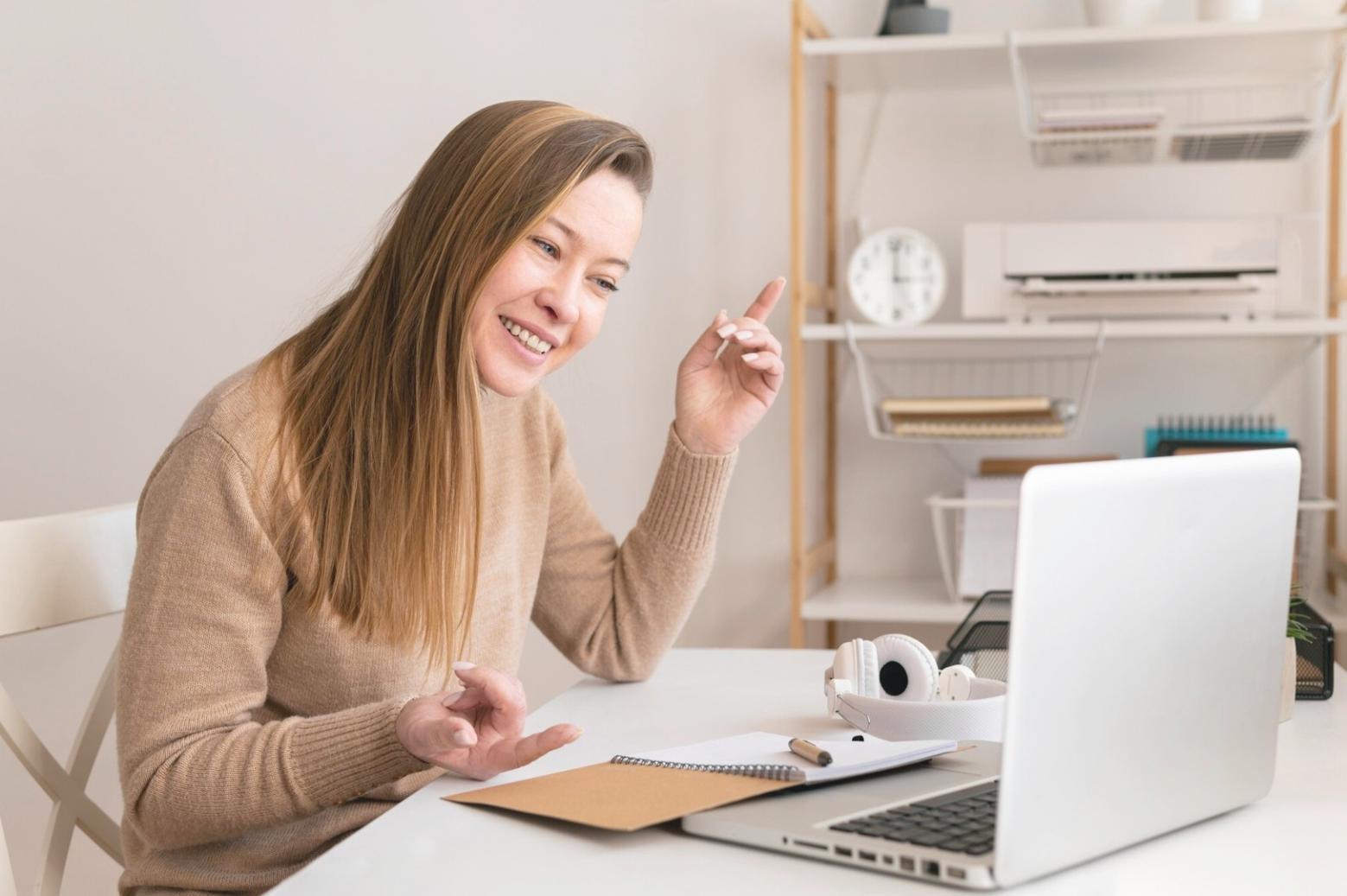 Financial analyst reviewing complex data visualizations on multiple monitors
